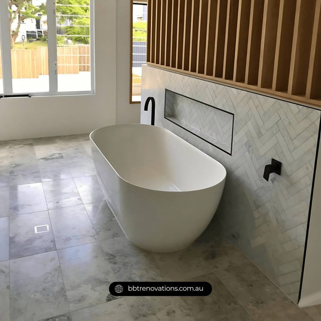 Elegant freestanding bathtub in a beautifully styled bathroom